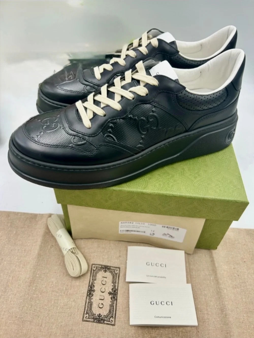 Men’s Gucci GG Embossed Leather Sneakers. Size 12. Made in Italy.